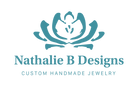 Logo of Nathalie B Designs with a stylized lotus flower design on a transparent background